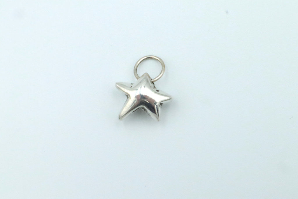 Irregular Star Charm