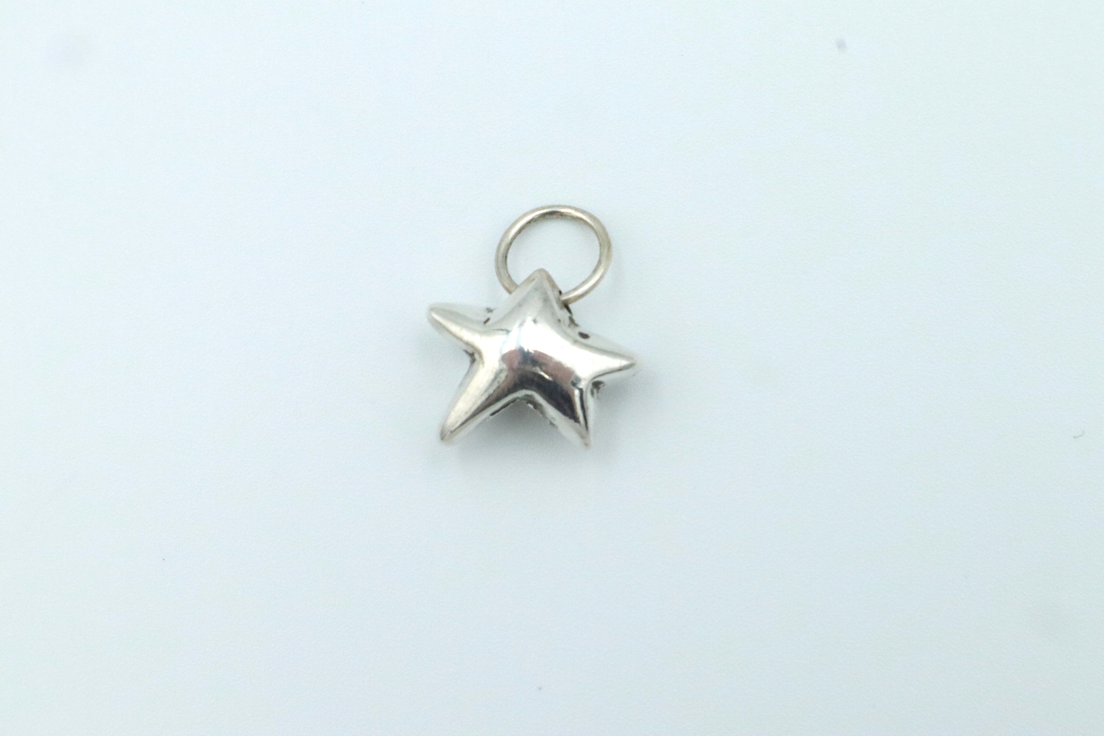 Irregular Star Charm